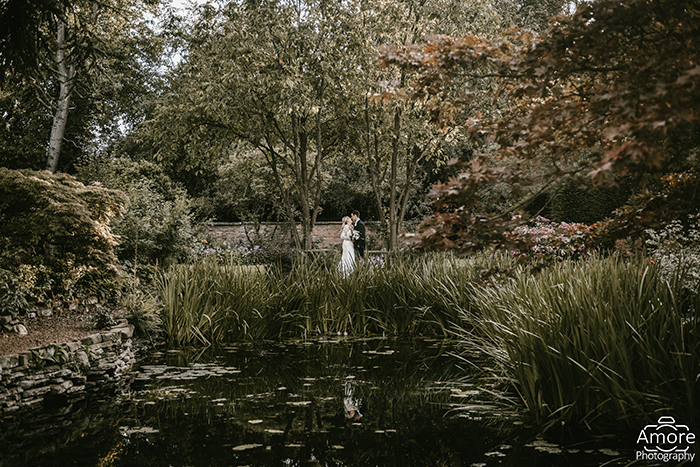 Bride and groom portraits in the gardens at Saltmarshe Hall